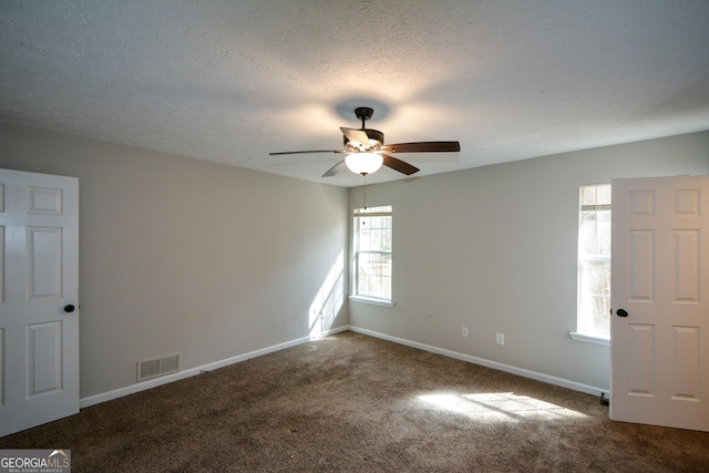98 Brenda Cir, Rockmart, GA 30153 - unfurnished room with visible vents, baseboards, carpet, and a ceiling fan