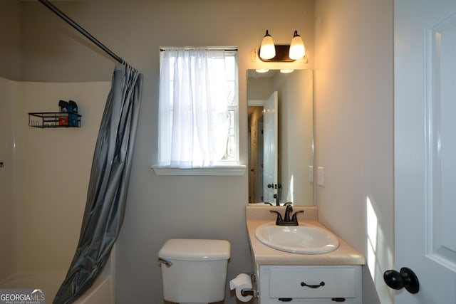 98 Brenda Cir, Rockmart, GA 30153 - bathroom with plenty of natural light, toilet, vanity, and shower / bathtub combination with curtain