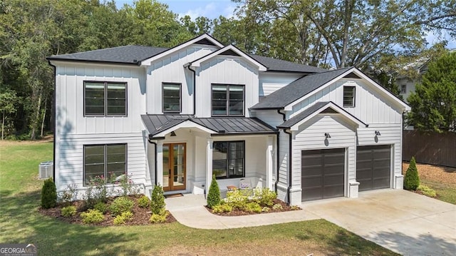 396 Academy St, Alpharetta, GA 30009 - modern farmhouse style home with french doors, driveway, a standing seam roof, central air condition unit, and board and batten siding