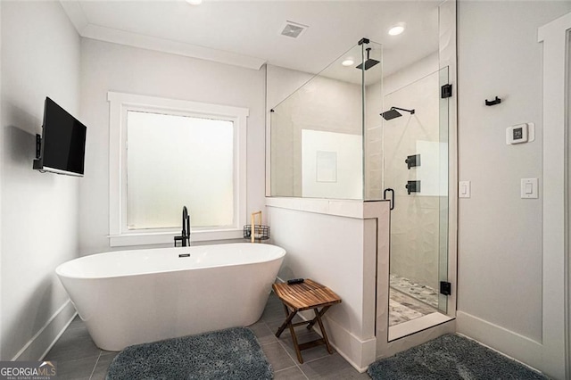 396 Academy St, Alpharetta, GA 30009 - full bathroom with baseboards, a freestanding bath, a shower stall, tile patterned flooring, and recessed lighting