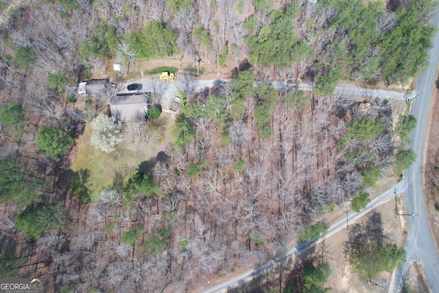 aerial view featuring a forest view
