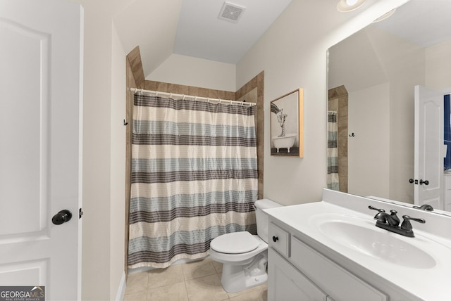 full bath with vanity, a shower with shower curtain, visible vents, tile patterned floors, and toilet