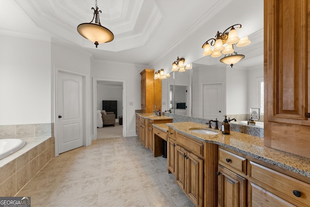full bath with vanity, ensuite bath, a relaxing tiled tub, crown molding, and a raised ceiling
