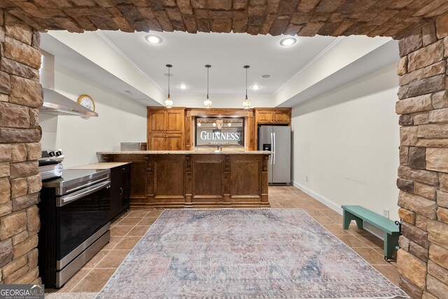 kitchen with pendant lighting, ornamental molding, a peninsula, appliances with stainless steel finishes, and light countertops