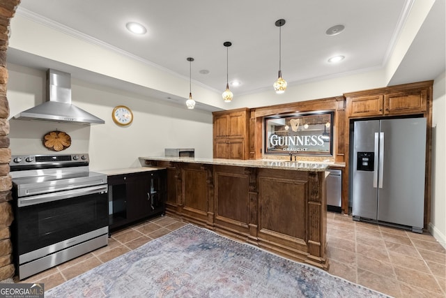 kitchen featuring appliances with stainless steel finishes, a peninsula, crown molding, and wall chimney range hood