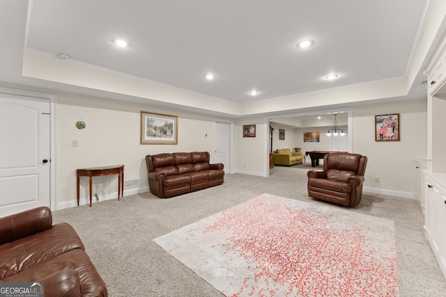 living room with pool table, a tray ceiling, recessed lighting, and baseboards