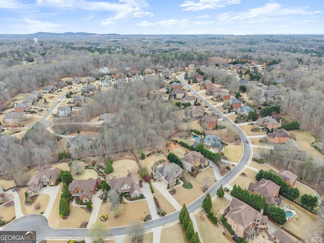 birds eye view of property with a residential view