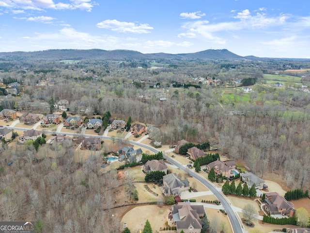 drone / aerial view featuring a mountain view