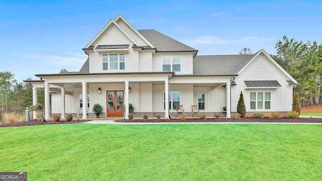 2 Forest Berry Ct, Newnan, GA 30265 - view of front of house with french doors, board and batten siding, and a front lawn