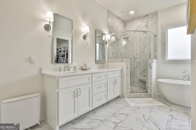 full bath with marble finish floor, a sink, and a marble finish shower