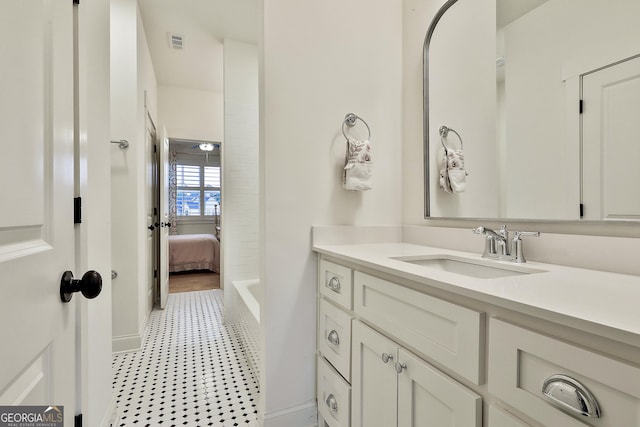 bathroom featuring vanity and visible vents