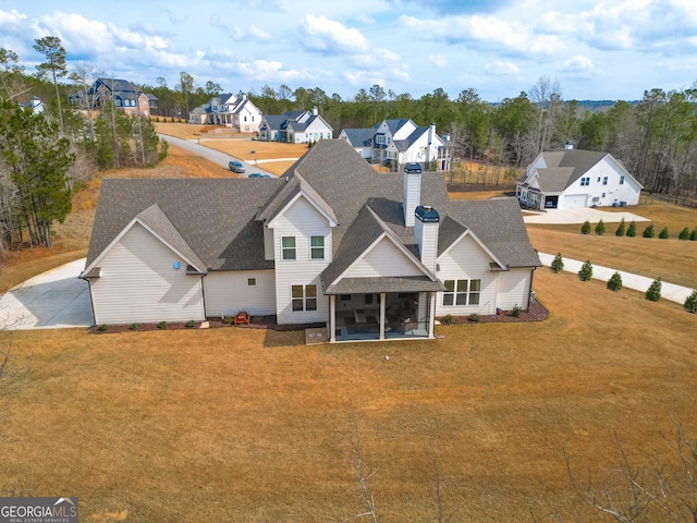 drone / aerial view featuring a residential view