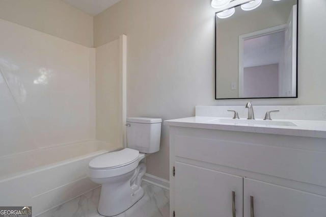 bathroom featuring shower / tub combination, vanity, toilet, marble finish floor, and baseboards