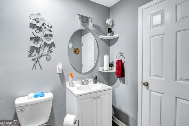 9224 Snipe Ln, Jonesboro, GA 30236 - half bathroom featuring vanity and toilet
