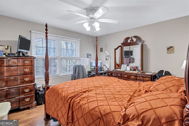 9224 Snipe Ln, Jonesboro, GA 30236 - bedroom with wood finished floors and a ceiling fan