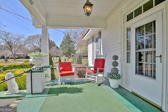 151 Flat Shoals Rd, Woodbury, GA 30293 - view of patio featuring a porch