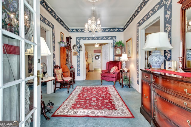 151 Flat Shoals Rd, Woodbury, GA 30293 - living area featuring carpet flooring, ceiling fan with notable chandelier, wallpapered walls, and baseboards