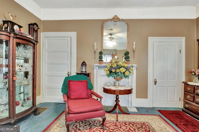 151 Flat Shoals Rd, Woodbury, GA 30293 - living area featuring crown molding, carpet flooring, and a ceiling fan