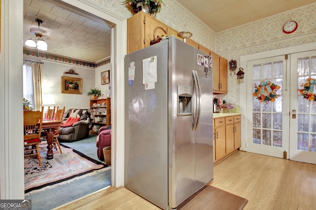 151 Flat Shoals Rd, Woodbury, GA 30293 - kitchen featuring wallpapered walls, light wood finished floors, stainless steel fridge with ice dispenser, and french doors