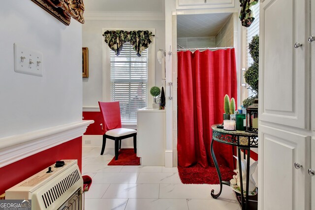 151 Flat Shoals Rd, Woodbury, GA 30293 - full bath with curtained shower, crown molding, heating unit, and marble finish floor