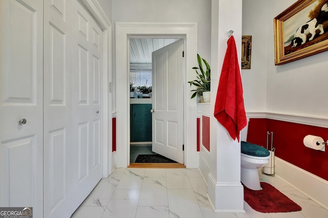 151 Flat Shoals Rd, Woodbury, GA 30293 - bathroom featuring marble finish floor, toilet, and baseboards