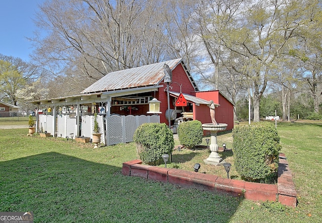 151 Flat Shoals Rd, Woodbury, GA 30293 - view of side of property with a yard and an outdoor structure