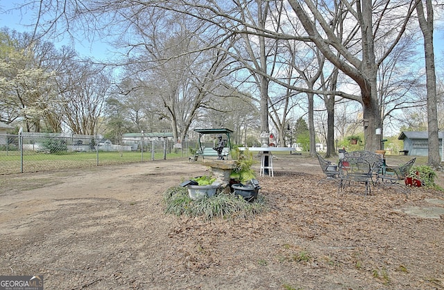 151 Flat Shoals Rd, Woodbury, GA 30293 - view of yard with fence