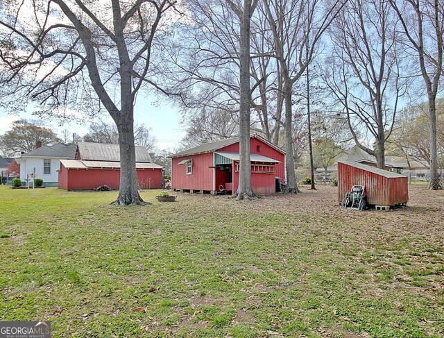 151 Flat Shoals Rd, Woodbury, GA 30293 - view of yard featuring an outdoor structure
