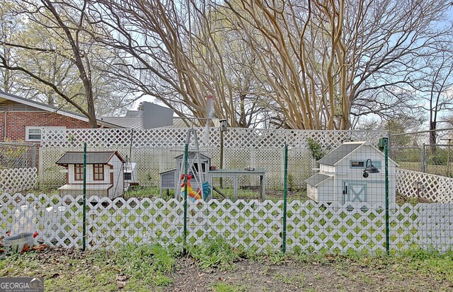 151 Flat Shoals Rd, Woodbury, GA 30293 - view of yard with fence