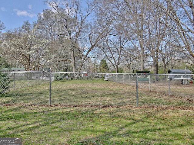 151 Flat Shoals Rd, Woodbury, GA 30293 - view of yard featuring fence