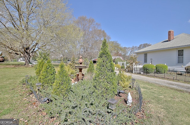 151 Flat Shoals Rd, Woodbury, GA 30293 - view of yard with fence and driveway
