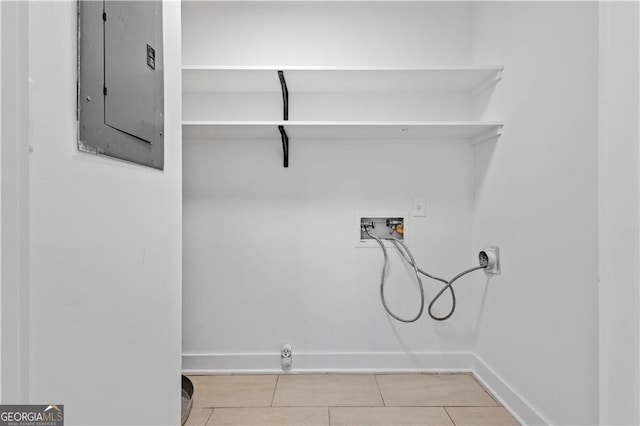 5225 Maple Valley Rd SW, Mableton, GA 30126 - laundry room featuring hookup for a washing machine, electric panel, gas dryer hookup, and tile patterned flooring