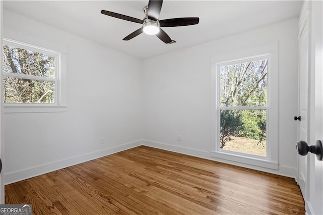 5225 Maple Valley Rd SW, Mableton, GA 30126 - empty room featuring wood finished floors and a ceiling fan