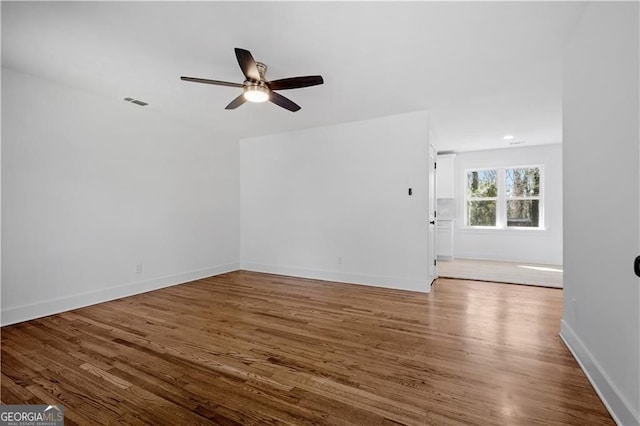 5225 Maple Valley Rd SW, Mableton, GA 30126 - spare room with ceiling fan and wood finished floors