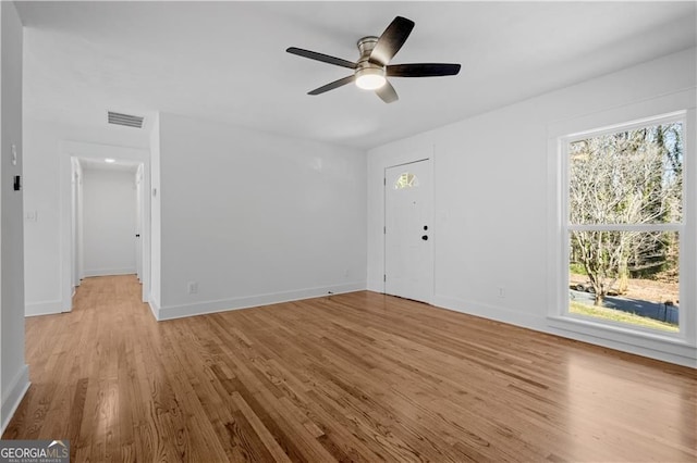5225 Maple Valley Rd SW, Mableton, GA 30126 - spare room with wood finished floors and ceiling fan