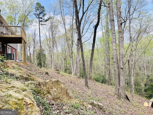 285 W0Lf Den Rd, Royston, GA 30662 - view of yard featuring a deck and central AC