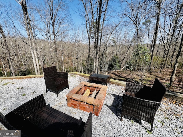 285 W0Lf Den Rd, Royston, GA 30662 - view of patio / terrace with an outdoor fire pit