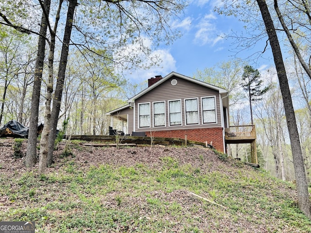 285 W0Lf Den Rd, Royston, GA 30662 - view of front of home with a chimney and brick siding