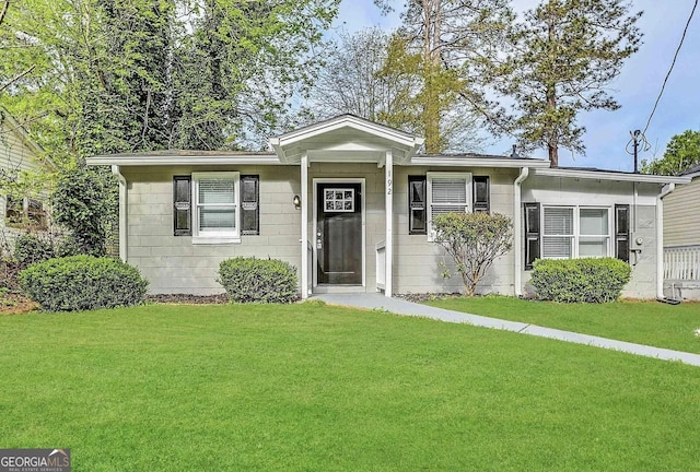 192 Margaret St, Fairburn, GA 30213 - view of front facade featuring a front yard and concrete block siding
