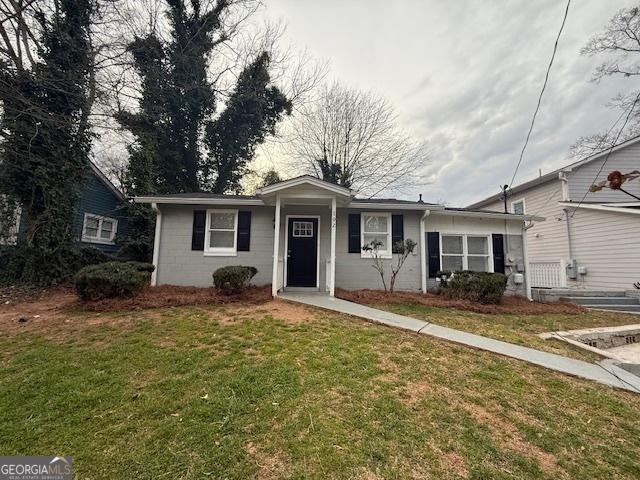 192 Margaret St, Fairburn, GA 30213 - bungalow with concrete block siding and a front yard