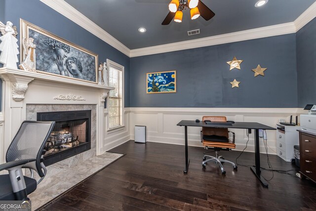 hallway with baseboards, arched walkways, ornamental molding, and hardwood / wood-style flooring