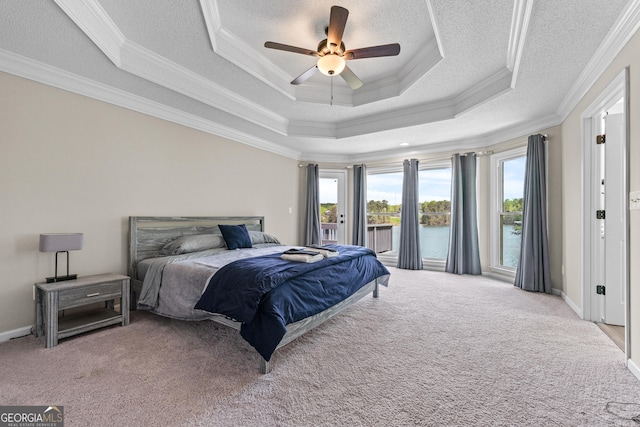bedroom featuring access to exterior, carpet flooring, and ornamental molding