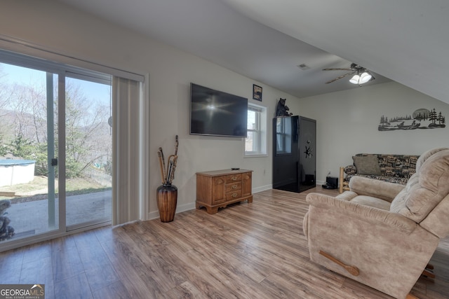 625 Sunnyside Shores Rd, Hiawassee, GA 30546 - living room featuring visible vents, baseboards, ceiling fan, and light wood finished floors