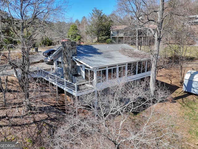 625 Sunnyside Shores Rd, Hiawassee, GA 30546 - exterior space with metal roof and a chimney