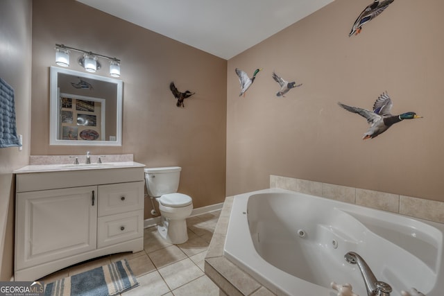 625 Sunnyside Shores Rd, Hiawassee, GA 30546 - bathroom featuring toilet, a whirlpool tub, tile patterned flooring, baseboards, and vanity