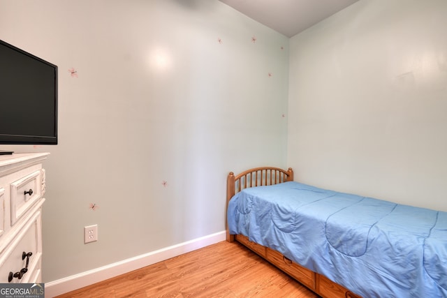 625 Sunnyside Shores Rd, Hiawassee, GA 30546 - bedroom featuring light wood-style flooring and baseboards