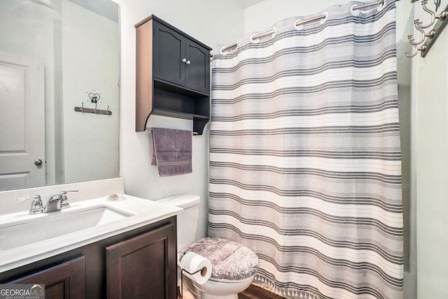 215 Apalachee Dr, Bethlehem, GA 30620 - bathroom with toilet, a shower with curtain, and vanity