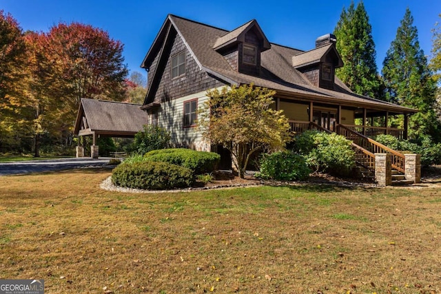 2778 Kelly Ln, Hiawassee, GA 30546 - view of side of home with a yard, stairs, and a chimney