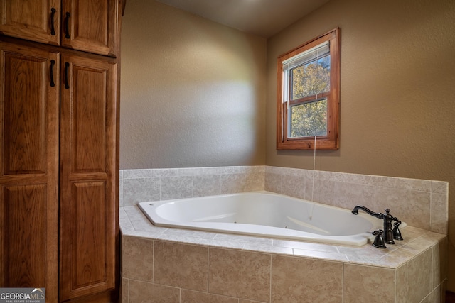 2778 Kelly Ln, Hiawassee, GA 30546 - bathroom featuring a garden tub and a textured wall