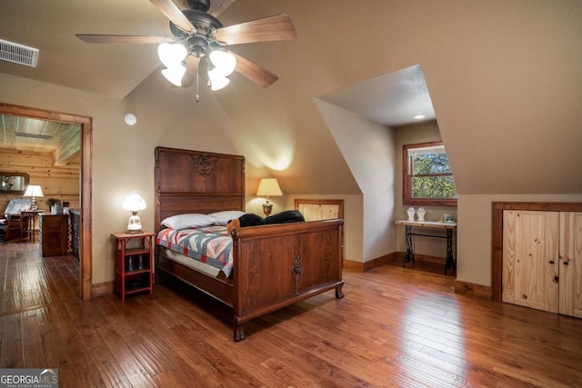 2778 Kelly Ln, Hiawassee, GA 30546 - bedroom with vaulted ceiling and hardwood / wood-style floors